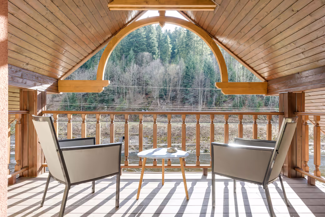 A light-coloured decking wood