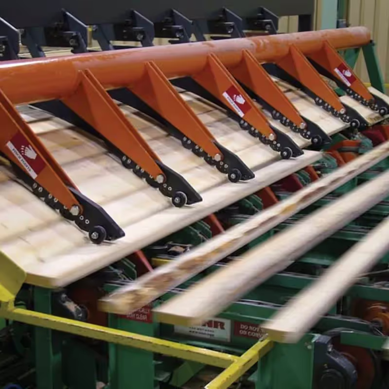 Alimenteur de planches à quatre cames 